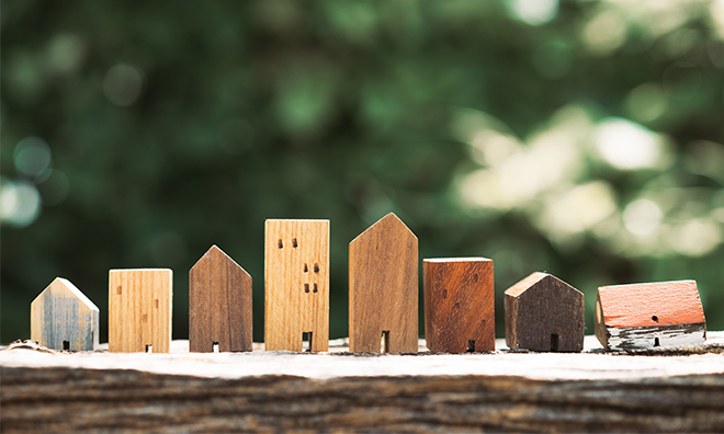 Wooden toy houses forming a city