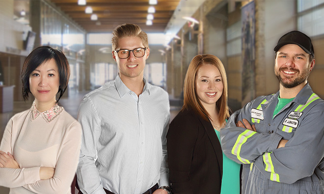 Four employees posing for a picture