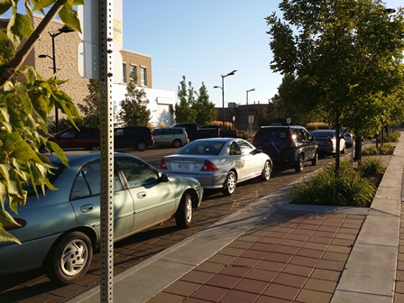 Cars parked by the Community Centre