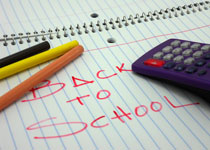 Notebook, pencils and a calculator