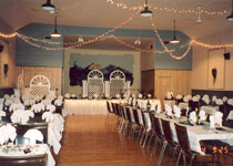 Hall with stage decorated for an event