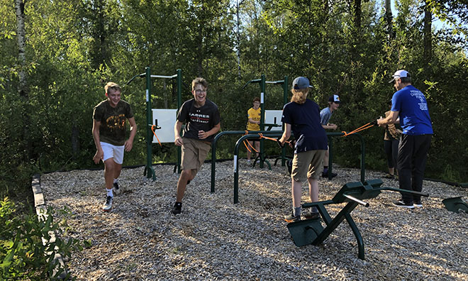 Athletes training outdoors at Strathcona Wilderness Centre