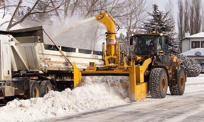 Image showing a County crew clearing snow on a residential road