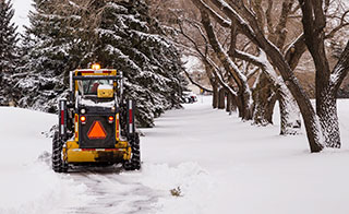 Image showing equipment clearing snow from a County trail