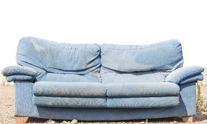 old couch mishapen and worn