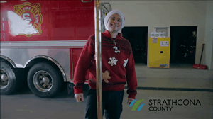Firefighter sliding up the pole